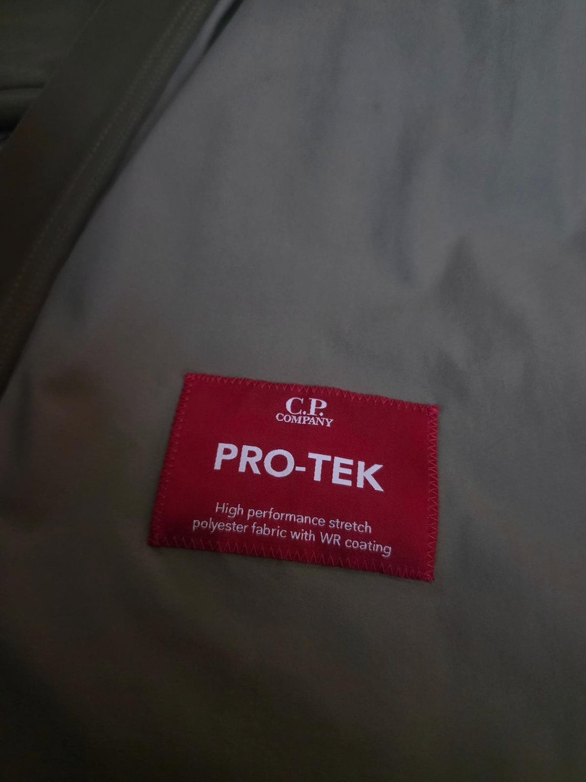 C.P. Company Pro-Tek Lens Hooded Jacket – 06CMOW019A 004117A 672 – Khaki – 56