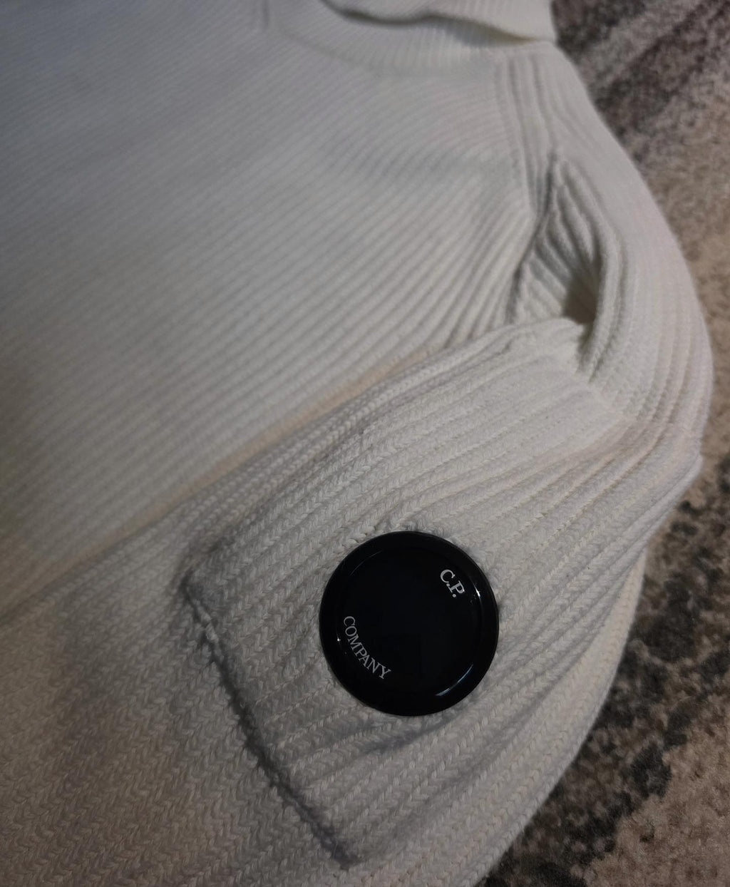 C.P. Company Full Rib Roll Neck Jumper – 15CMKN079A 006608A 103 – Gauze White – 50